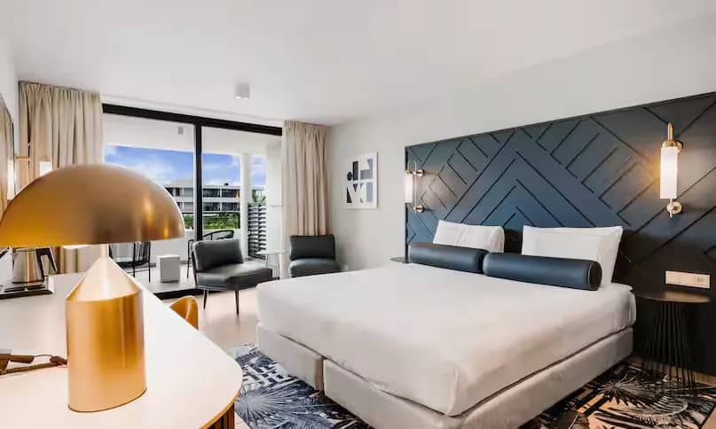 1 King Bed Deluxe Partial Oceanview - image