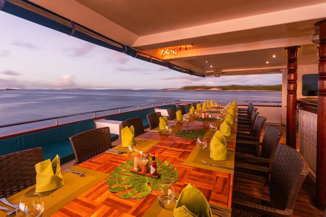 Shaded dining area set up for guests
