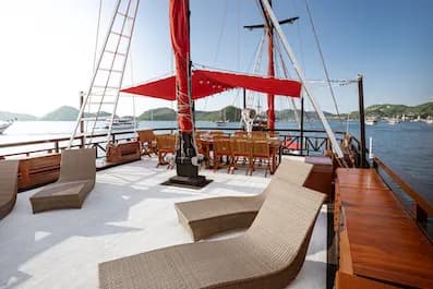 Sun deck with lounge chairs and table