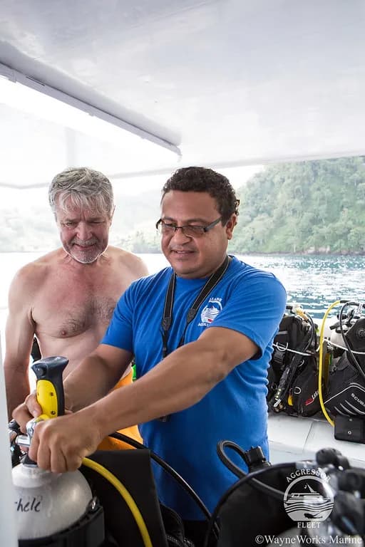 Scuba divers prepare aboard the Oceanic Aggressor II liveaboard in Costa Rica.