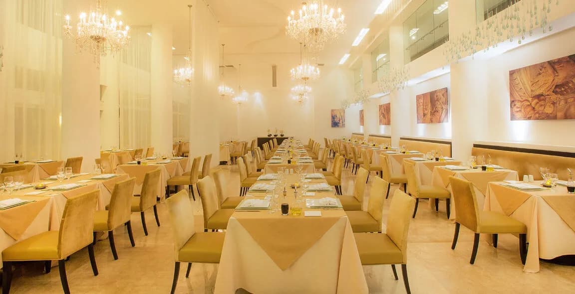 Tables and chairs in Terraza restaurant at Playacar Palace. Tables and chairs in Terraza restaurant at Playacar Palace.