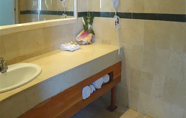 A bathroom at Fantasy Island Roatan Resort.