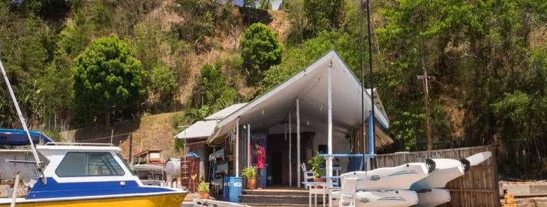 Boats at a dock at the watersports center at Tufi Resort Papua New Guinea Boats at a dock at the watersports center at Tufi Resort Papua New Guinea