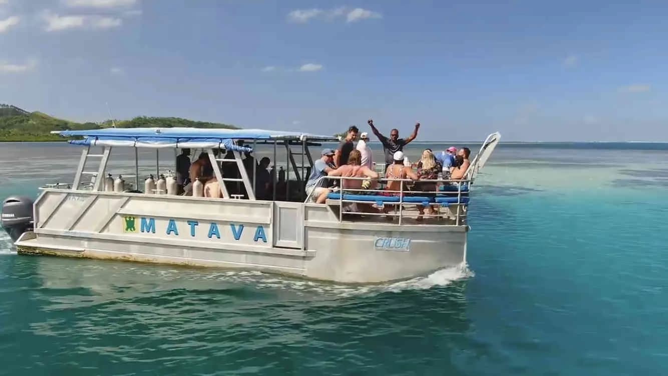 Happy divers on the dive boat Happy divers on the dive boat