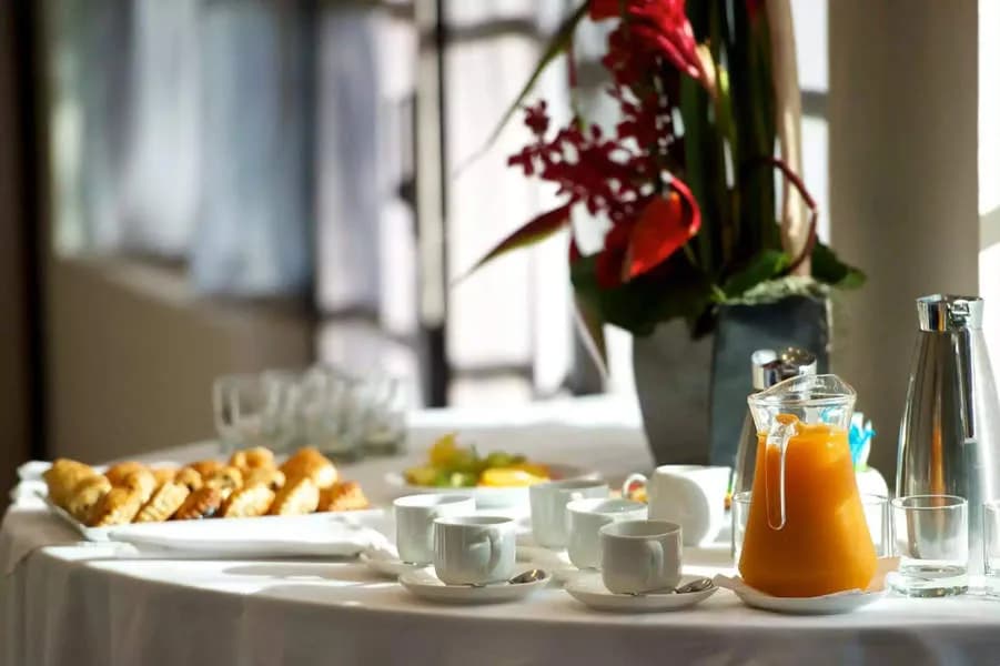 A selection of snacks and beverages on a table at Te Moana Tahiti Resort A selection of snacks and beverages on a table at Te Moana Tahiti Resort
