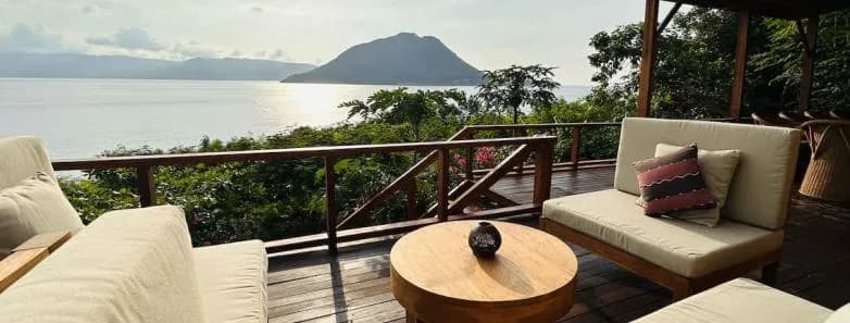 A lounge area overlooks the Pantar Strait at Alor Tanapi Dive Resort. A lounge area overlooks the Pantar Strait at Alor Tanapi Dive Resort.