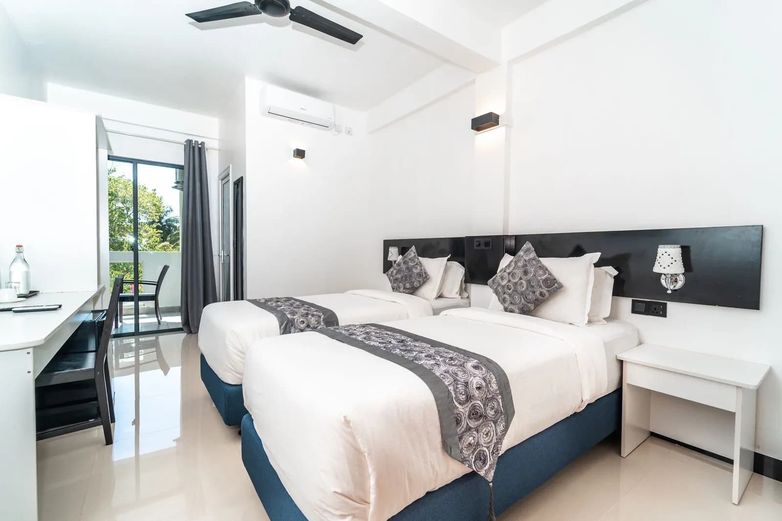 The two spacious beds of the Deluxe Twin Room The two spacious beds of the Deluxe Twin Room