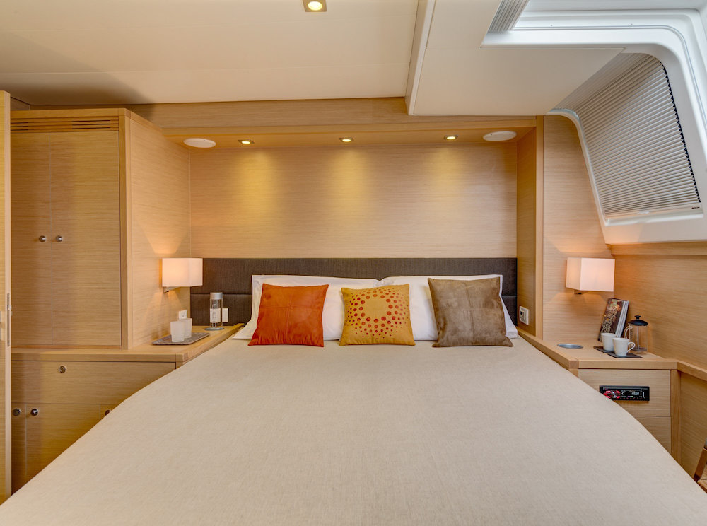 The large and spacious bed in the catamaran cabins