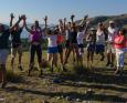 A group of people get excited for the camera in Komodo National Park