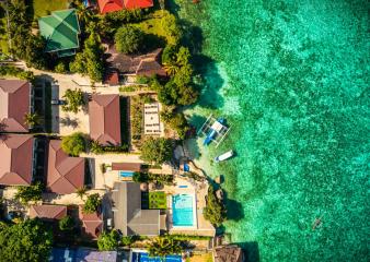 Cebu Seaview Dive Resort ariel view of ocean , pool, and resorts rooms