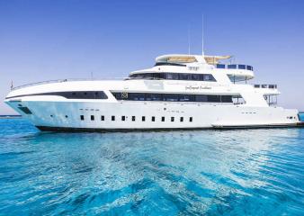 The M/Y Excellence on crystal blue waters