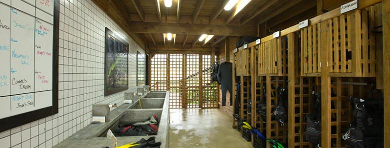 A dive equipment room at Barefoot Caye Roatan