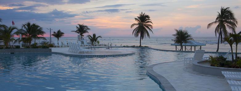 A dusky view of the pool at Cayman Brac Beach Resort