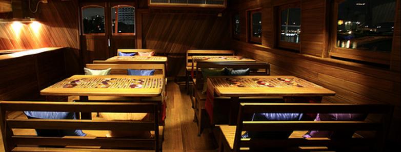 Indoor dining area of the Diva Andaman Liveaboard