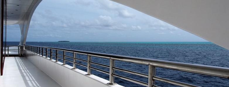 Enjoy breathtaking ocean vistas from the balcony of the MV Emperor Serenity Liveaboard in the Maldives.