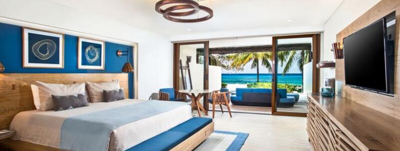 A modern luxury beach front room at Presidente Intercontinental Resort & Spa in Cozumel, Mexico.