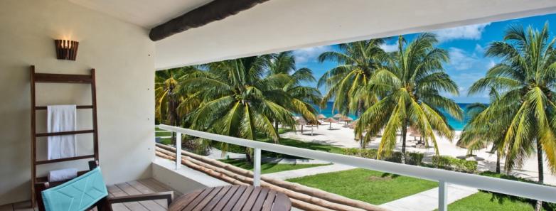 A balcony looks out to the ocean at Presidente Intercontinental Resort & Spa in Cozumel, Mexico.
