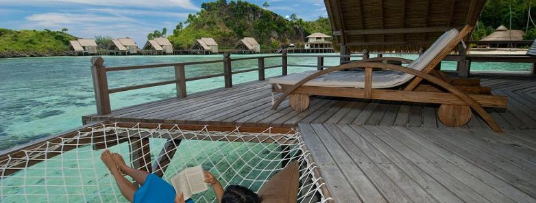 An overwater hammock at Misool Resort