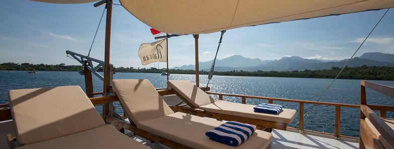 Sun loungers aboard a boat at Plataran Menjangan Resort & Spa Bali