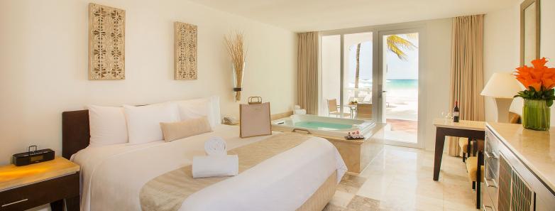 The interior of a spacious sand suite at Playacar Palace.