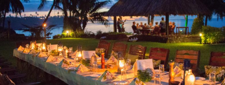 A long table set for dinner at Paradise Taveuni