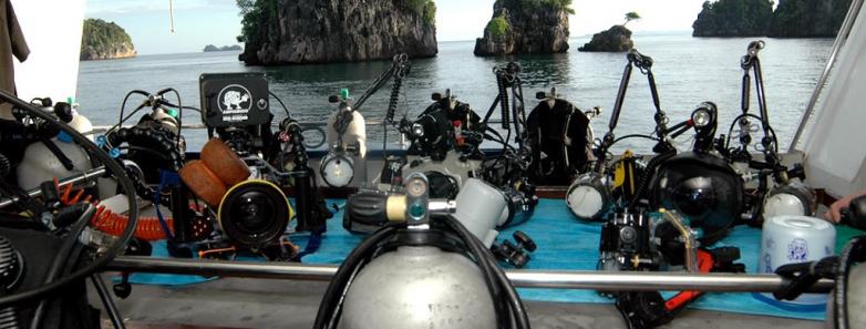 Underwater cameras on a table on the dive deck of Raja Ampat Aggressor 