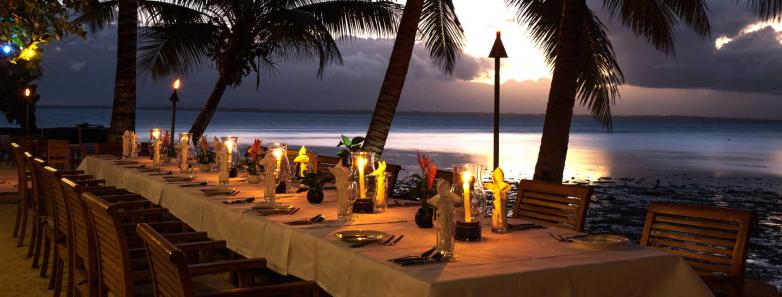 A long table is set for dinner at Toberua Island Resort Fiji.