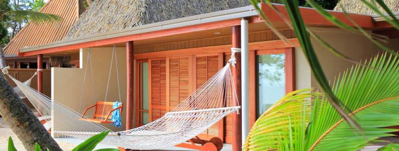 A hammock in front of Lagilagi Villa at Toberua Island Resort Fiji.