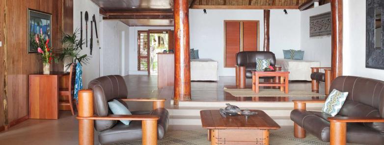 A spacious indoor lounge in Lagilagi Villa at Toberua Island Resort Fiji.