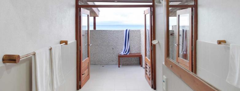 A modern bathroom in a premium bure at Toberua Island Resort Fiji.