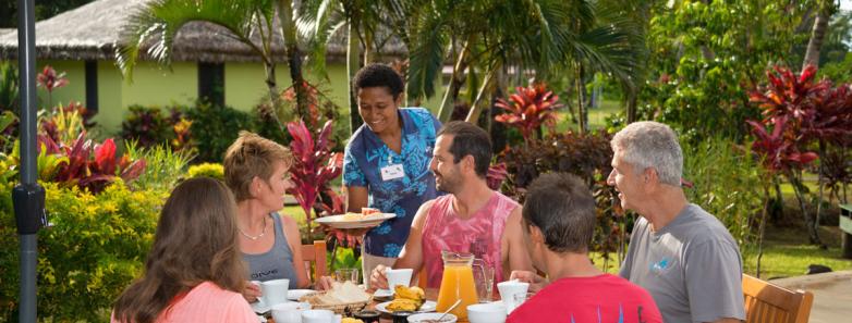 Diners eating at Waidroka Bay Resort, Fiji