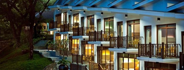A row of hotel rooms at Aiyanar Beach & Dive Resort