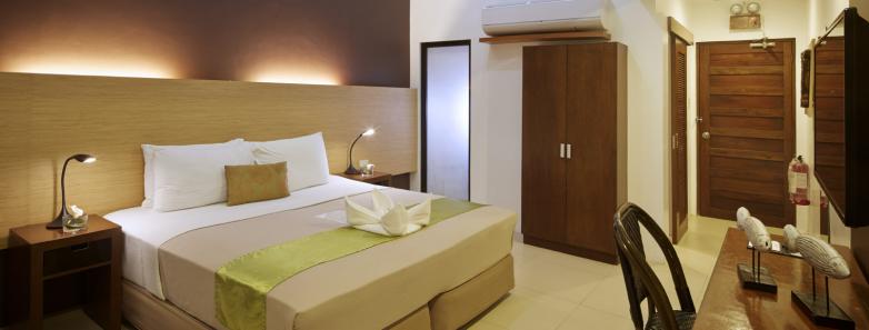 A deluxe room at Aiyanar Beach & Dive Resort