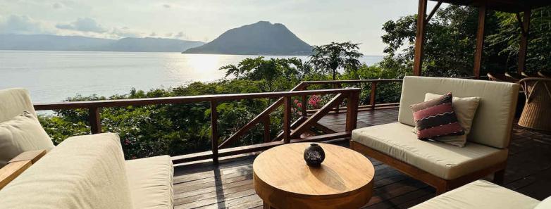 A lounge area overlooks the Pantar Strait at Alor Tanapi Dive Resort.