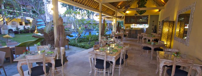 Tables in the restaurant at Bayshore Villas Candidasa.