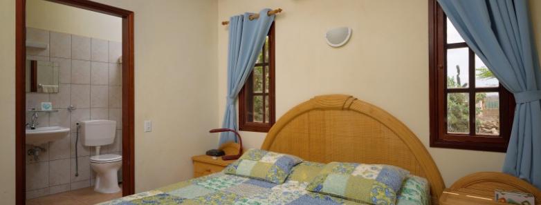 A bedroom in a 2 bed bungalow at Captain Don's Habitat, Bonaire