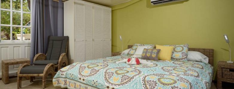 A bedroom in a 3 bed bungalow at Captain Don's Habitat dive resort in Bonaire