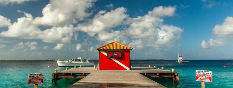 A small dive building on the jetty at Captain Don's Habitat dive resort in Bonaire