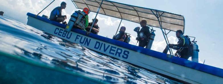 The Cebu Fun Divers dinghy in the ocean