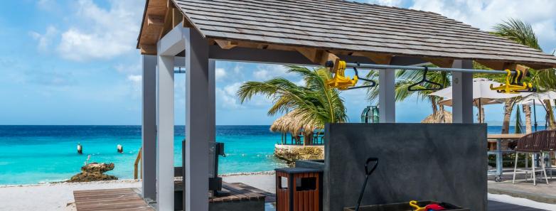 Beachside scuba rinse tanks and hanging area at Delfins Beach Resort Bonaire.