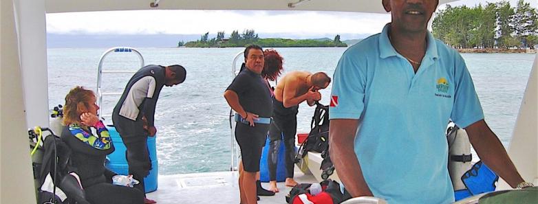Divers prepare for a scuba dive at Fantasy Island Roatan Resort.