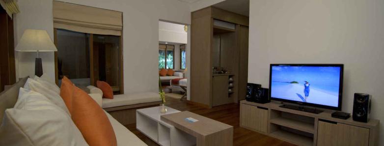 A modern lounge area in a honeymoon pool villa at Kuramathi Island Resort Maldives.