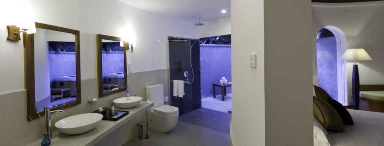 A luxurious bathroom in a superior beach villa at Kuramathi Island Resort Maldives.
