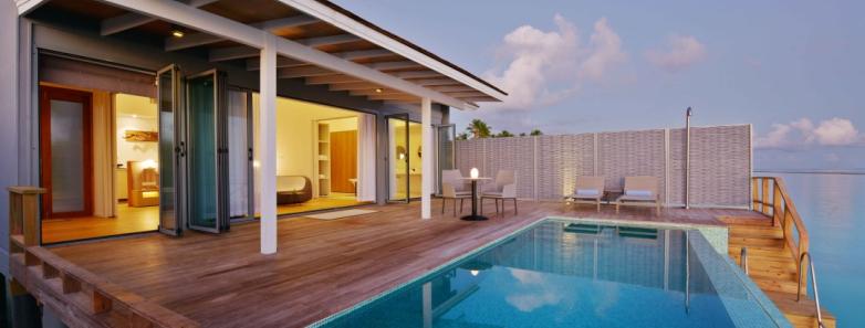An inviting pool with a sea view in a water villa with pool at Kuramathi Island Resort Maldives.