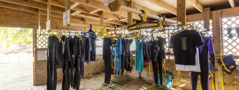 Scuba diving equipment hangs to dry at Little Cayman Beach Resort
