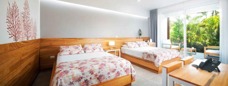 Queen beds overlooking Naboo Resort & Dive Center