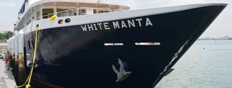 White Manta liveaboard sitting at a pier