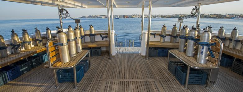 Shaded dive deck with scuba tanks