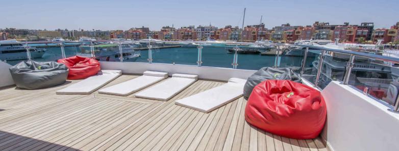 The spacious sundeck with bean bag chairs and mats