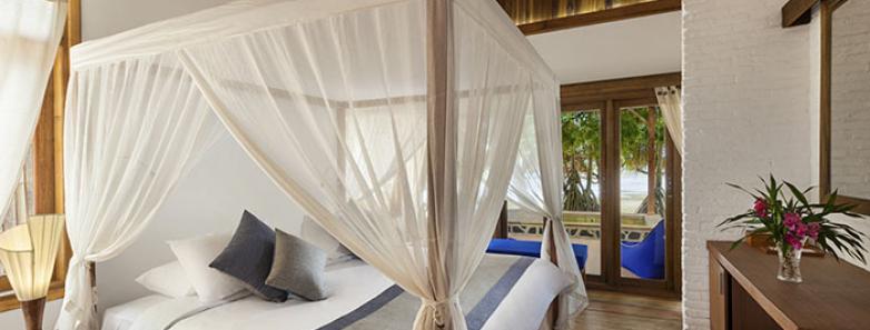 Luxury villa bedroom at Siladen Resort & Spa Bunaken